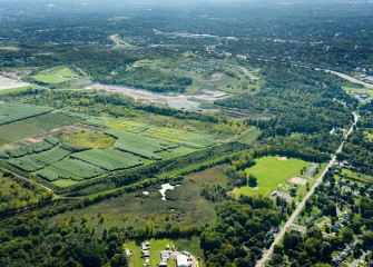 The Shrub Willow Farm (center left), created in partnership with SUNY College of Environmental Science and Forestry, consists of approximately 125 acres of former industrial property in Camillus that is now used to grow and harvest willow biomass to produce sustainable energy.
