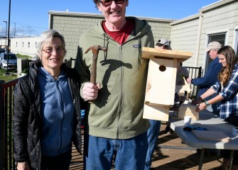 Mary Giehl and Greg Boyer, of Syracuse, with an assembled bluebird nesting box. According to Audubon, the Eastern Bluebird, state bird of New York, has declined in many areas due in part to loss of nesting sites.