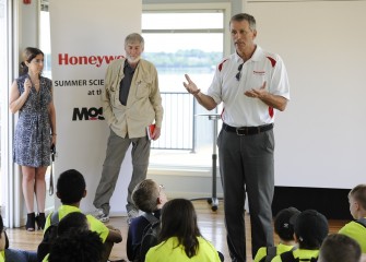 Honeywell Syracuse Program Manager Stephen Miller welcomes students to the Honeywell Onondaga Lake Visitors Center as they look forward to a week of hands-on science exploration in the Onondaga Lake watershed.