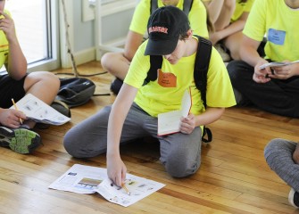 Students look for species of phytoplankton and zooplankton shown on their worksheets.