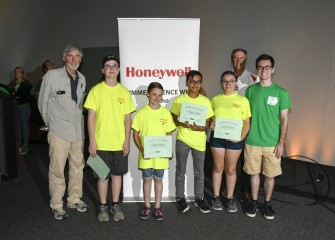 Members of the Gray Team pose with MOST Chief Program Officer Peter Plumley and Stephen Miller, from Honeywell.